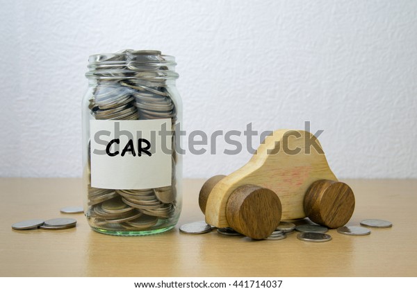 Money saving for Car\
in the glass bottle 