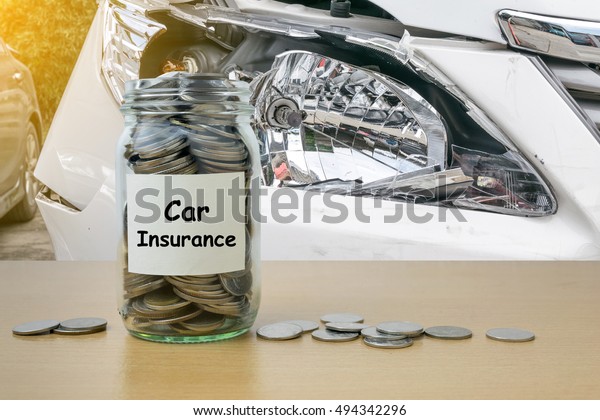 Money
saving for Car Insurance in the glass bottle
