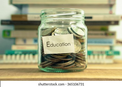 Money Saving For Education In The Glass Bottle For Money Concept