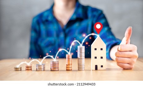 money saving growing from salary to buy house for family home with good location with concept of happy property real estate agent and life management business - Shutterstock ID 2112949433