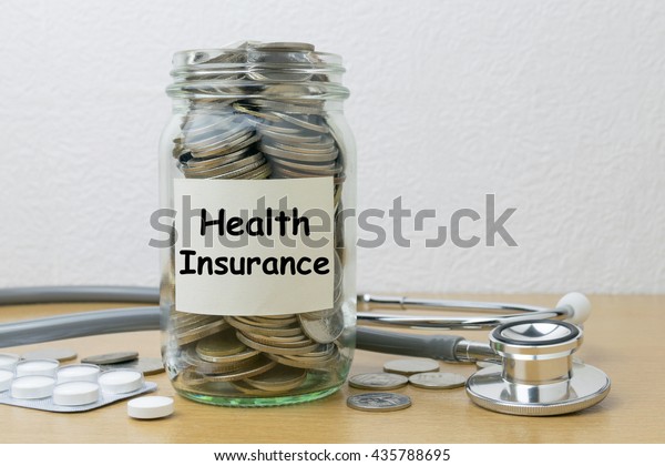 Money\
saving for health Insurance in the glass bottle\
