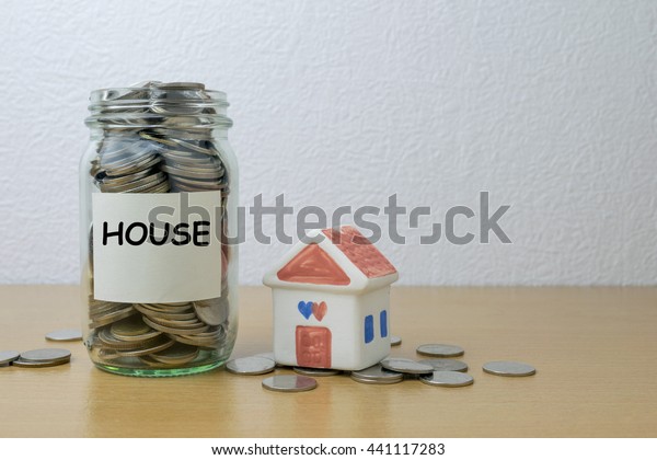 Money saving for\
house in the glass bottle\
