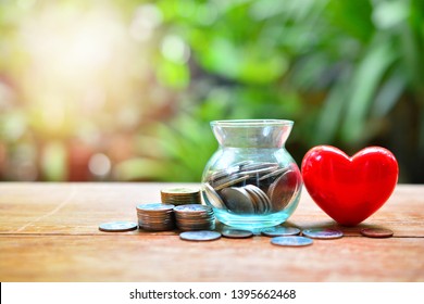 Money Saving Set With Red Heart For Concept Donation And Philanthropy