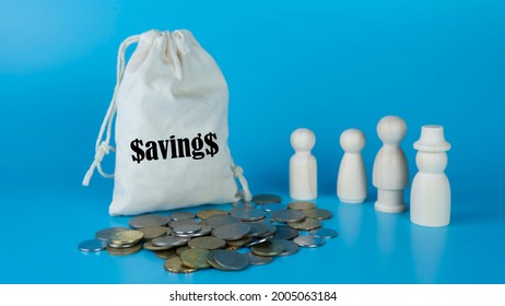 Money Saving Tips Concept. Selective Focus On The Green Board  With A Text Saving Tips. How To Save Money Fro Holiday, Paying Loan Or Investment Concept