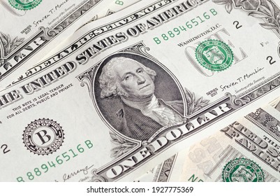 Money, US Dollar Banknotes Background. Close Up Photo On The Figure Of George Whashington On The One Dollar Bill. Flat Lay. Finance And Economy Concept. 