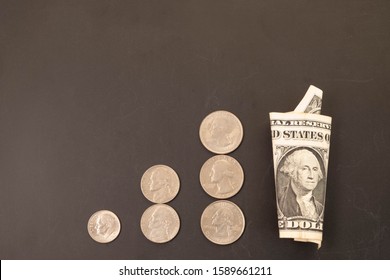 Money, US Dollars Bank Notes, Penny, Nickel, Dime, Quarter On Black Background. Finance And Economy Concept.