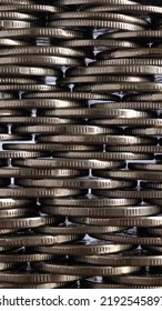 Money Wall. Chaotic Pile Of Coins Close-up. Nickel Coin Texture. Vertical Business Background Made Of Many Coin Edges. Economy Finance And Bank Backdrop. Tax And Credit. Mobile Phone Wallpaper. Macro