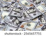 Money wallpaper background with US dollar bills. Pile of american cash. One hundred usd dollars banknotes.