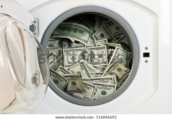 money in washing machine\
close up