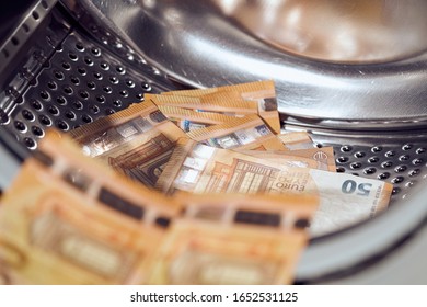 Money in washing machine, closeup view. Money washing. Money laundering