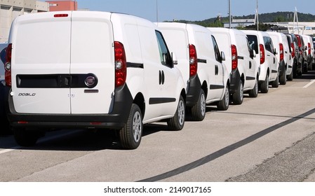 Monfalcone, Italy. May 10, 2021. Backs Of Brand New Doblò, Panel Van Of Fiat Automaker, In A Row Outside The Dealership.