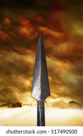 Mongol Spear Tip Against A Grainy Misty Landscape