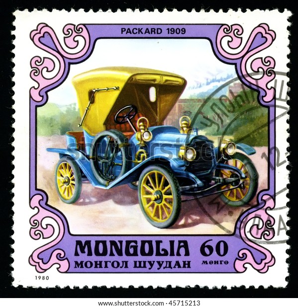 MONGOLIA - CIRCA 1980: A postage stamp printed in\
the Mongolia shows image of the motor industry history - car\
Packard 1909, circa\
1980