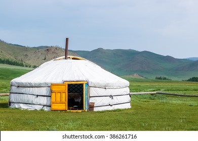 Mongolian yurt called a ger on grassy steppe of northern Mongolia - Powered by Shutterstock