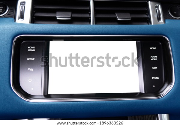 Monitor in car with isolated blank screen use
for navigation maps and GPS. Isolated on white with clipping path.
Car detailing. Car display with blank screen. Modern car red
leather interior
details.