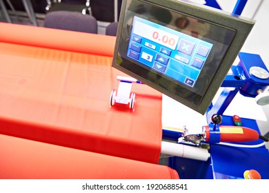 Monitor control panel of measuring fabric inspection machine in the workshop