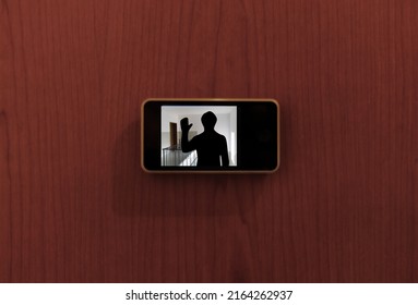 Monitor Digital Peephole Watching A Stranger Outside The Door