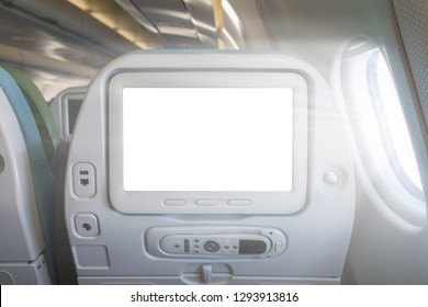 Monitor On The Passenger Seat In An Airplane Isoliroan On A White Background.