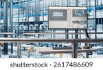 Monitor in smart photovoltaics factory displaying real time system performance metrics. Display in industry 4.0 solar panels plant tracking energy production and efficiency through IoT sensors
