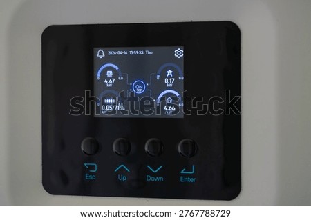 Monitoring energy usage smart device interface home digital display close-up efficiency insights
