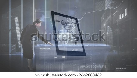 Monitoring engineer manipulating floating 3D display in technology lab wearing suit, copy space. Futuristic, innovation, data visualization, sleek, science, professional, digital interface