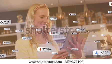 Monitoring staff using tablet smartphone with floating icons at cafe counter with jars on shelves. Technology, socialmedia, retail, modern, lifestyle, digital, communication