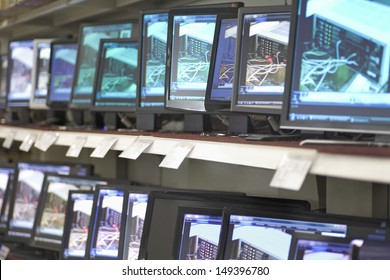 Monitors Displayed In Shelves At An Electronic Store