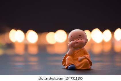 Monk Baby Is Leaning His Head On His Hand, Far East Temple Culture