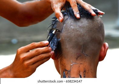 Monk In Buddhism Use Clipper To Shave The Head Pre Novice. Thai Culture