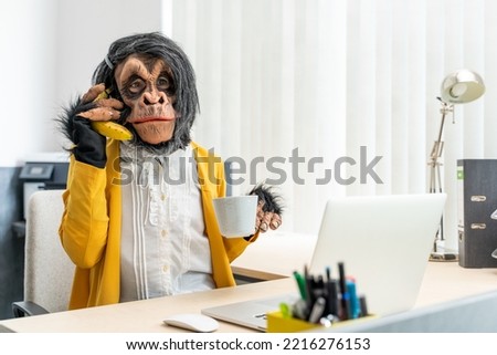 Monkey Business Woman talking on banana phone