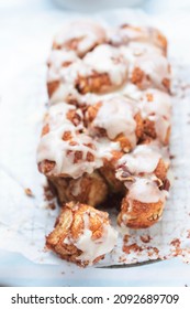 Monkey yeast bread with cinnamon and pecans, vanilla icing