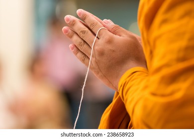 Monk's hand in Buddhism ceremony  - Powered by Shutterstock