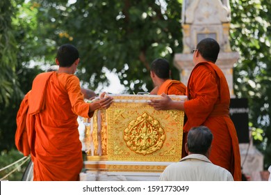 
Monks Holding The Coffin In The Funeral Of The Thai Buddhist Tradition