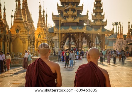 Monks at Shwedagon Pagoda in Yangon, Burma Myanmar