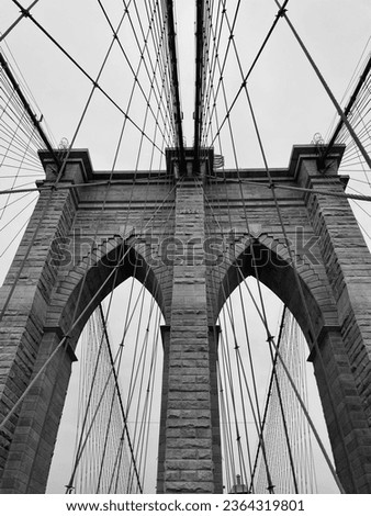 A Monochromatic image of the iconic Brooklyn Bridge in New York City, USA