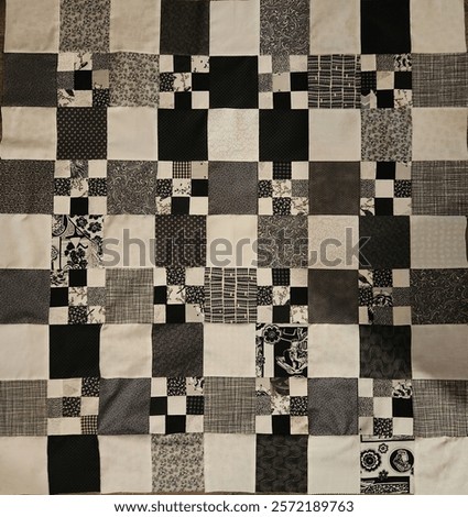 mono-chromatic nine patch quilt top