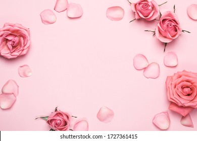 Monochrome Arrangement of beautiful roses. Flower roses frame on pink pastel background. Mothers day, Valentines Day, Birthday Greeting card.