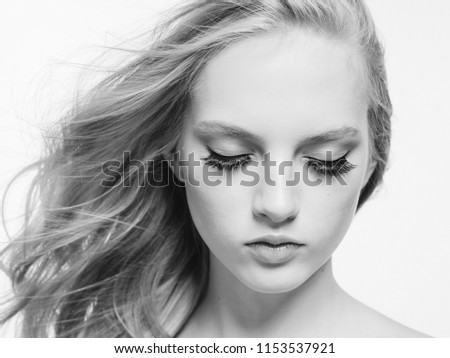 Monochrome beauty woman face isolated on white skin care portrait with beautiful lashes eyes