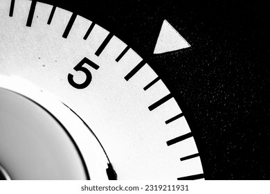 monochrome close-up of an analog laboratory timer set to six - Powered by Shutterstock