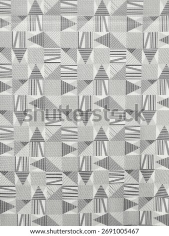 Monochrome geometric seamless pattern of triangles and squares filled with varying striped textures. 