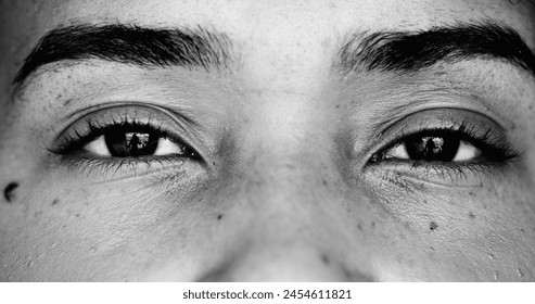 Monochrome Macro close-up woman's eyes, opening eyes in macro and dramatic intense black and white. Awakening concept, revelation and clear mind concept - Powered by Shutterstock