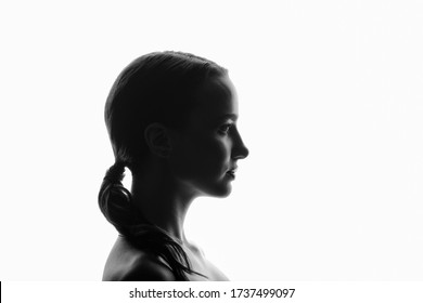 Monochrome portrait of a woman silhouette on a white background