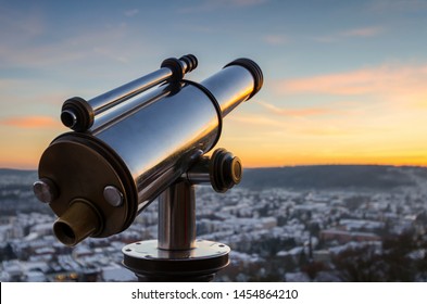 Monocular telescope at sunset over Marburg, Germany