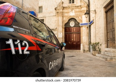 Monopoli, Italy - 20 August 2021: Carabinieri car with the emergency number 112 in the foreground and in the background the police station of Monopoli (Puglia-Italy)