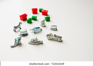 Monopoly Board Game, Playing Pieces, Cards On White Background