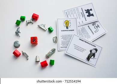 Monopoly Board Game, Playing Pieces, Cards On White Background