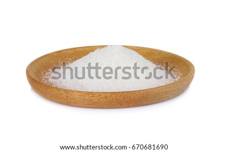 MonosodiumGlutamate (MSG or E621) on wooden plate isolated on white background.