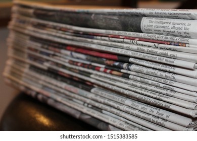 Monroe Township, PA/USA - October 15, 2016: Newspapers On A Pile Stacked High