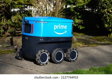 Monroe, WA, USA - February 21, 2022; Amazon Prime Scout Autonomous Electric Delivery Vehicle On A Sidewalk In Monroe Washington