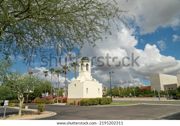 Monsoon clouds\
float over downtown Mesa,\
Arizona